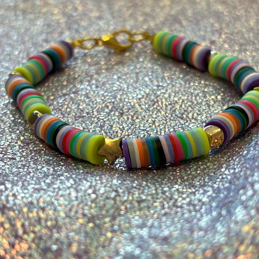 Girls multi colored clay beads bracelet with gold star and block charms. - Picture 6 of 6